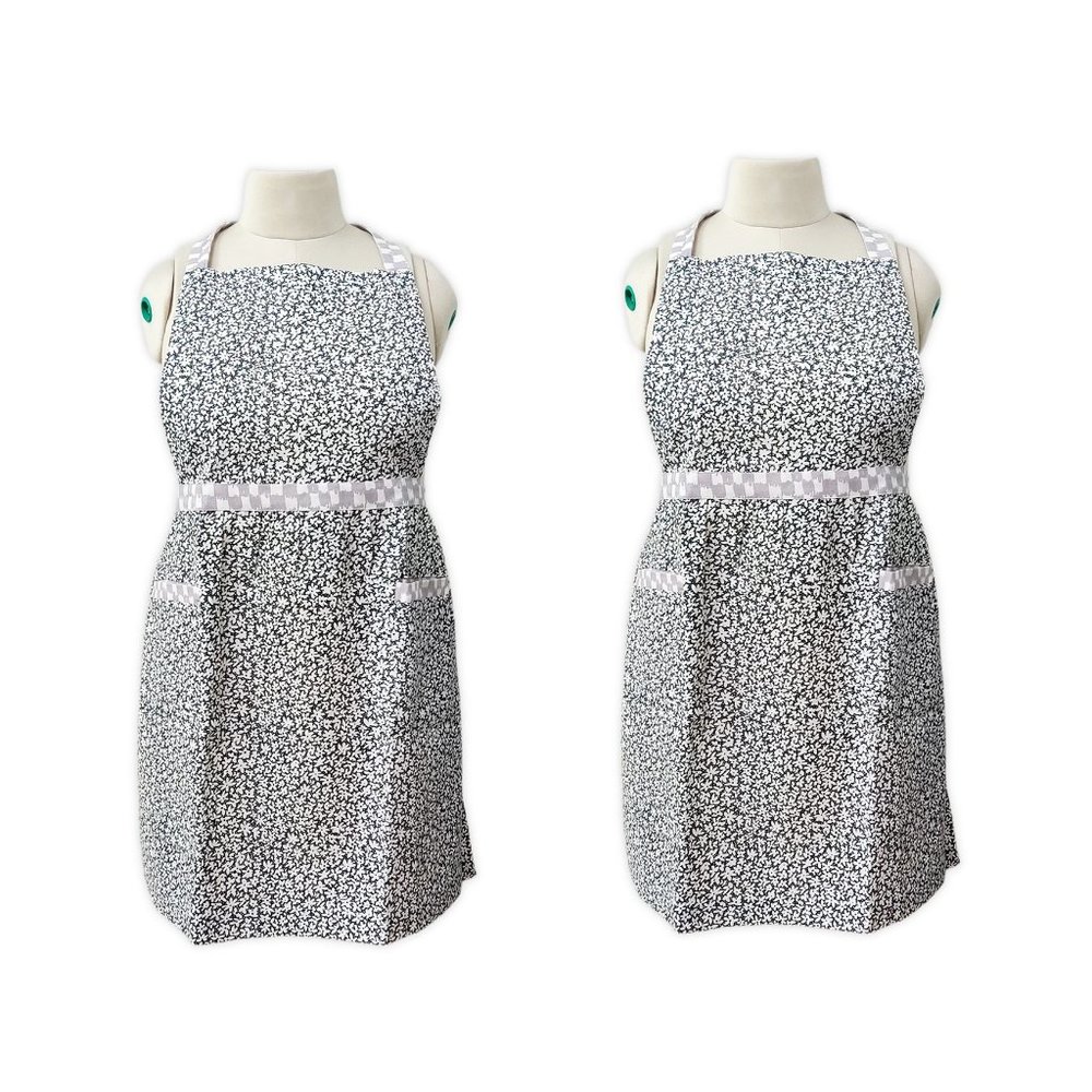 2 brand new Wild Sage Ditsy Daisy Aprons in White small floral pattern on Black